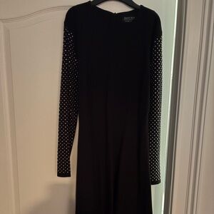 Elegant Black Dress with Embellished Sleeves